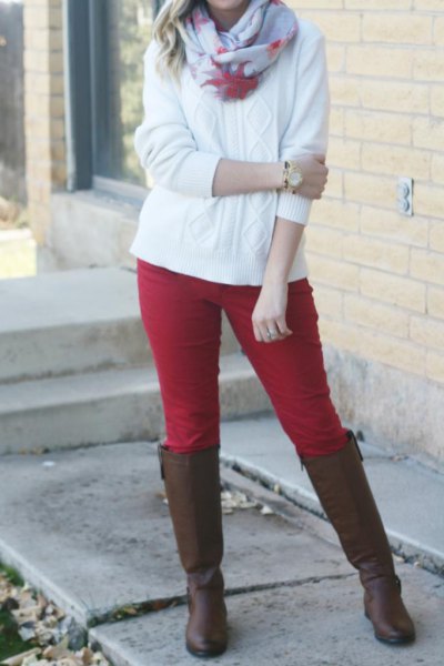 red breeches and white knit sweater