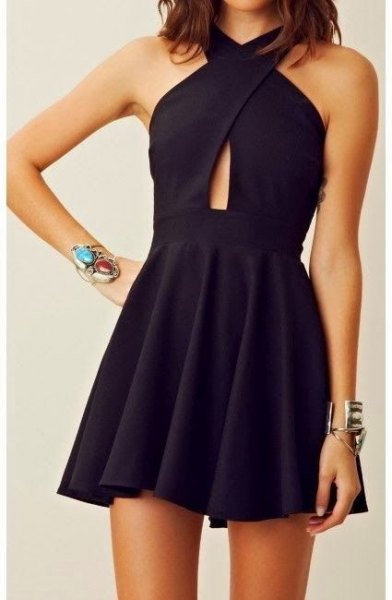 Mini dress with black cross neckline, tiny cutout at waist