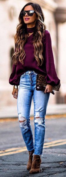 purple chiffon top with choker neckline and ripped skinny jeans