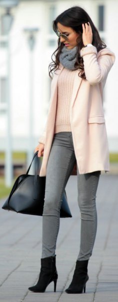 white ribbed sweater with gray skinny jeans and heeled ankle boots