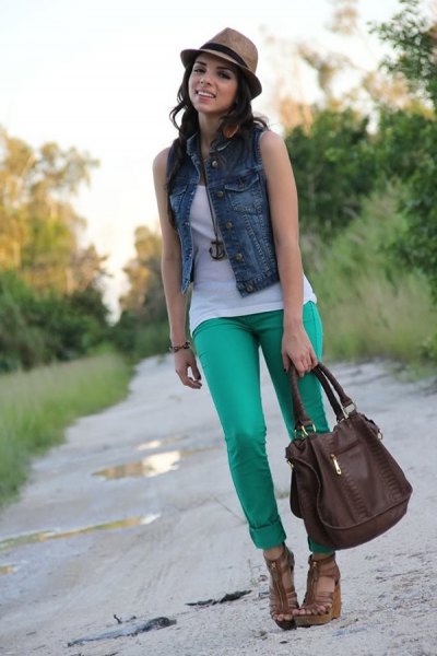 blue denim mini vest with white tank top and gray slim fit pants with cuffs