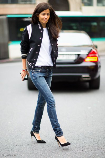 Skinny jeans in navy and white baseball jacket