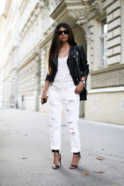 black leather jacket with tank top and white boyfriend jeans