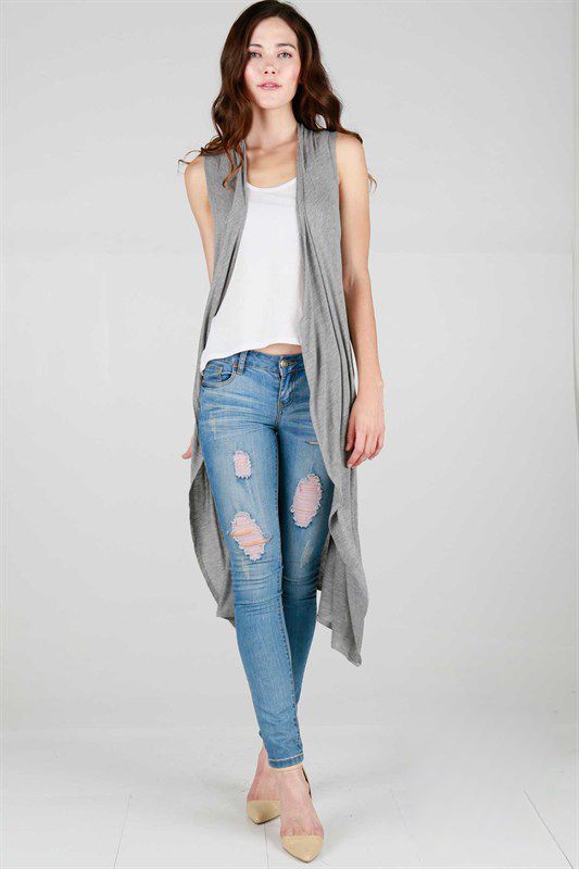 long sleeveless cardigan with ripped jeans