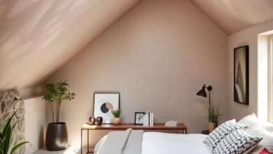 Cozy Attic Bedroom: Embracing Sloped Ceilings and Skylight Charm