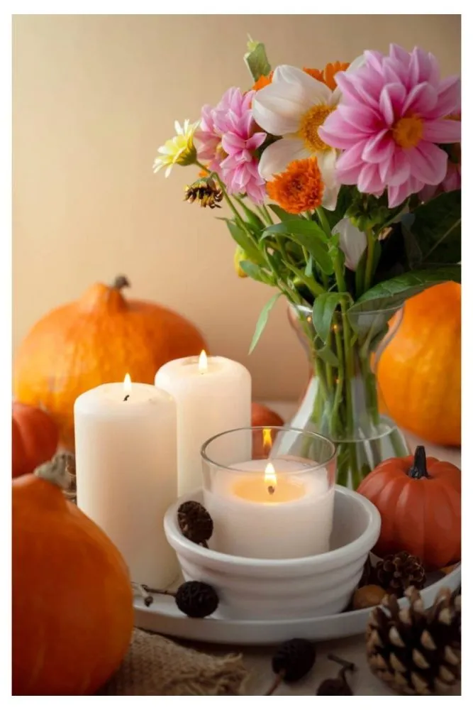 Candle Cloaked Floral Arrangement