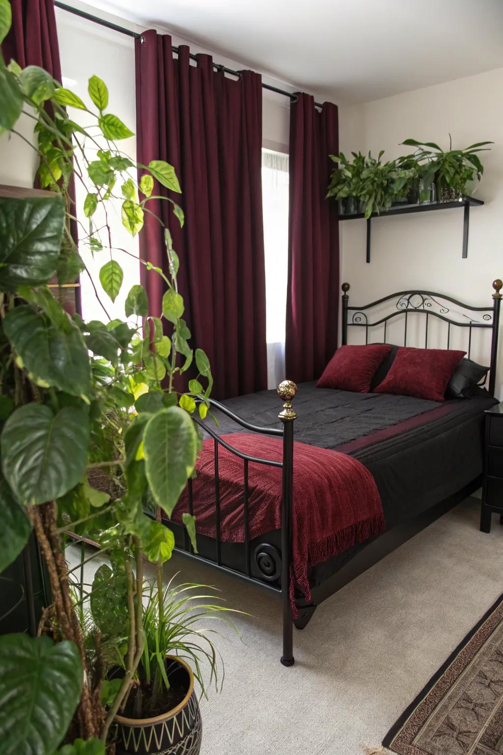 Greenery adds a refreshing, vibrant touch to your black and burgundy bedroom.