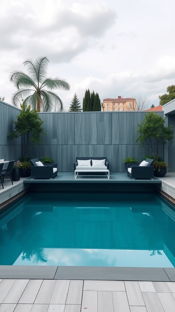 Modern geometric container pool surrounded by outdoor furniture and greenery.