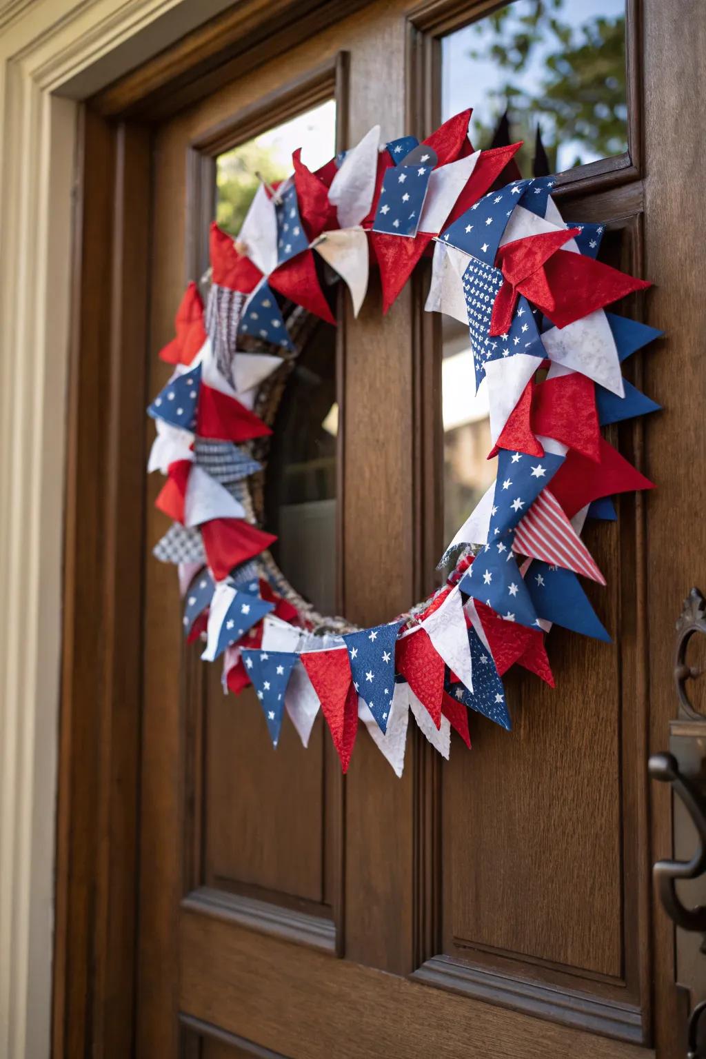 Wreath decorated with fabric flag accents.