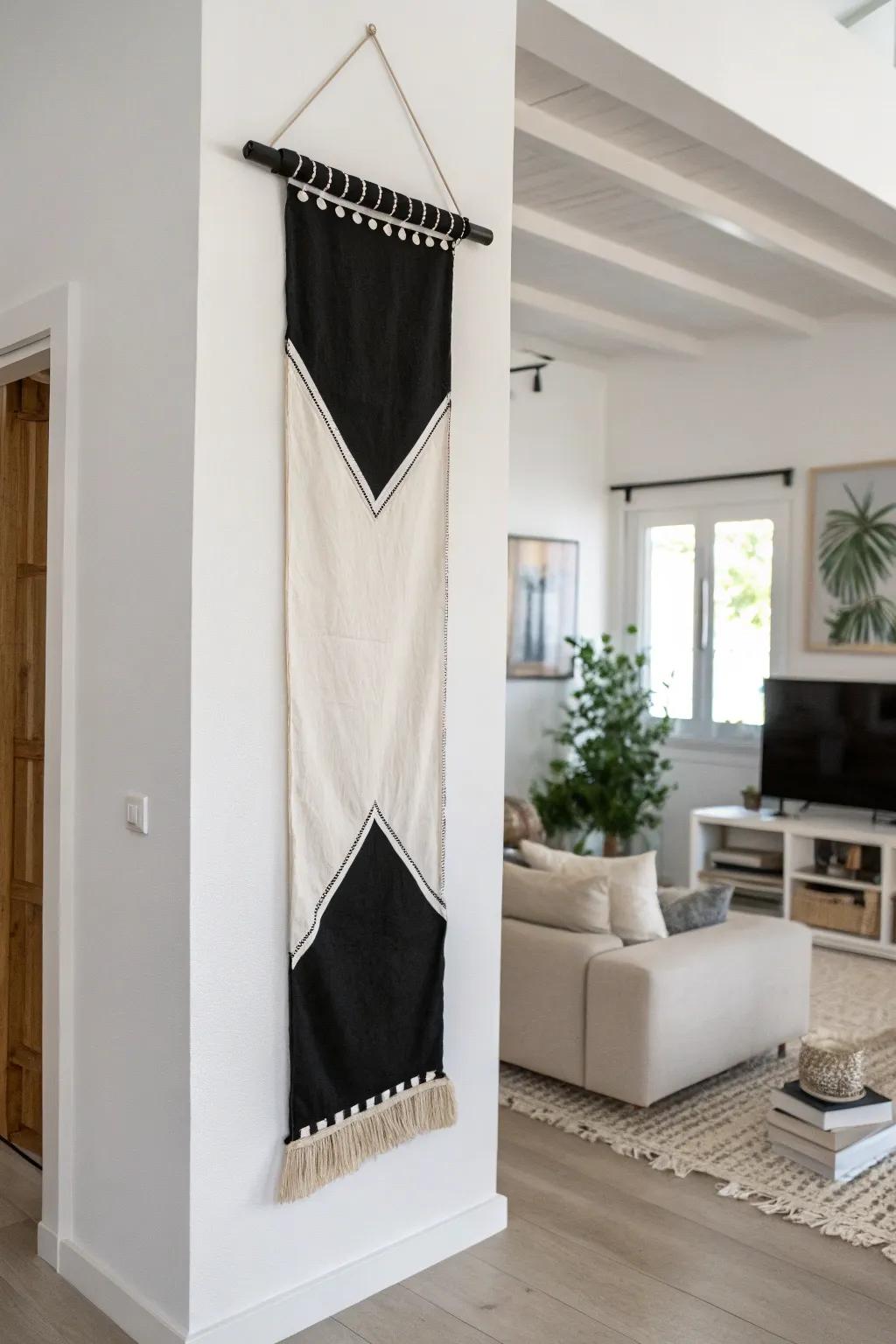 Black-and-white banner adds timeless elegance to a minimalist room.
