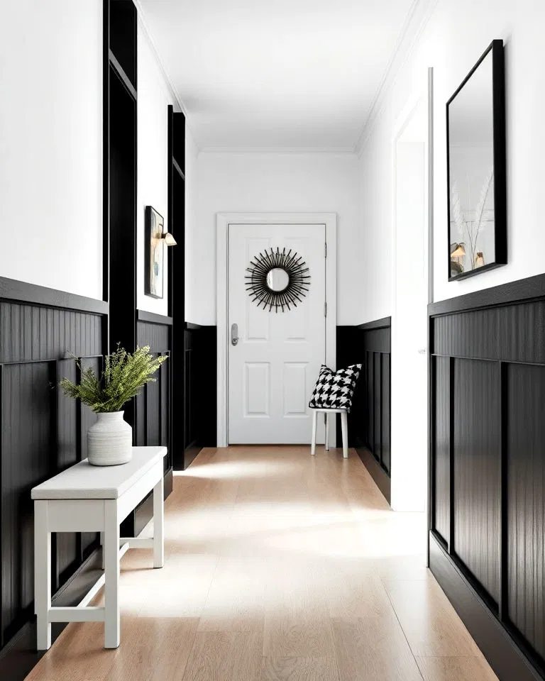 black paneling with white upper walls in hallway