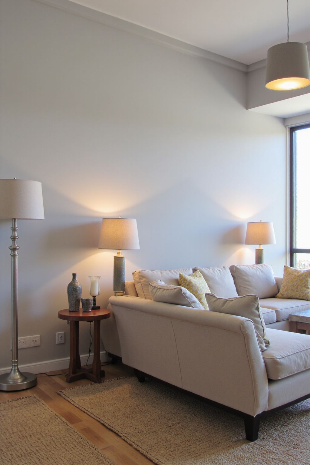 layered lighting living room, lighting living room ideas, cream sofa set living room, cozy living room warm, cozy living room lighting ideas